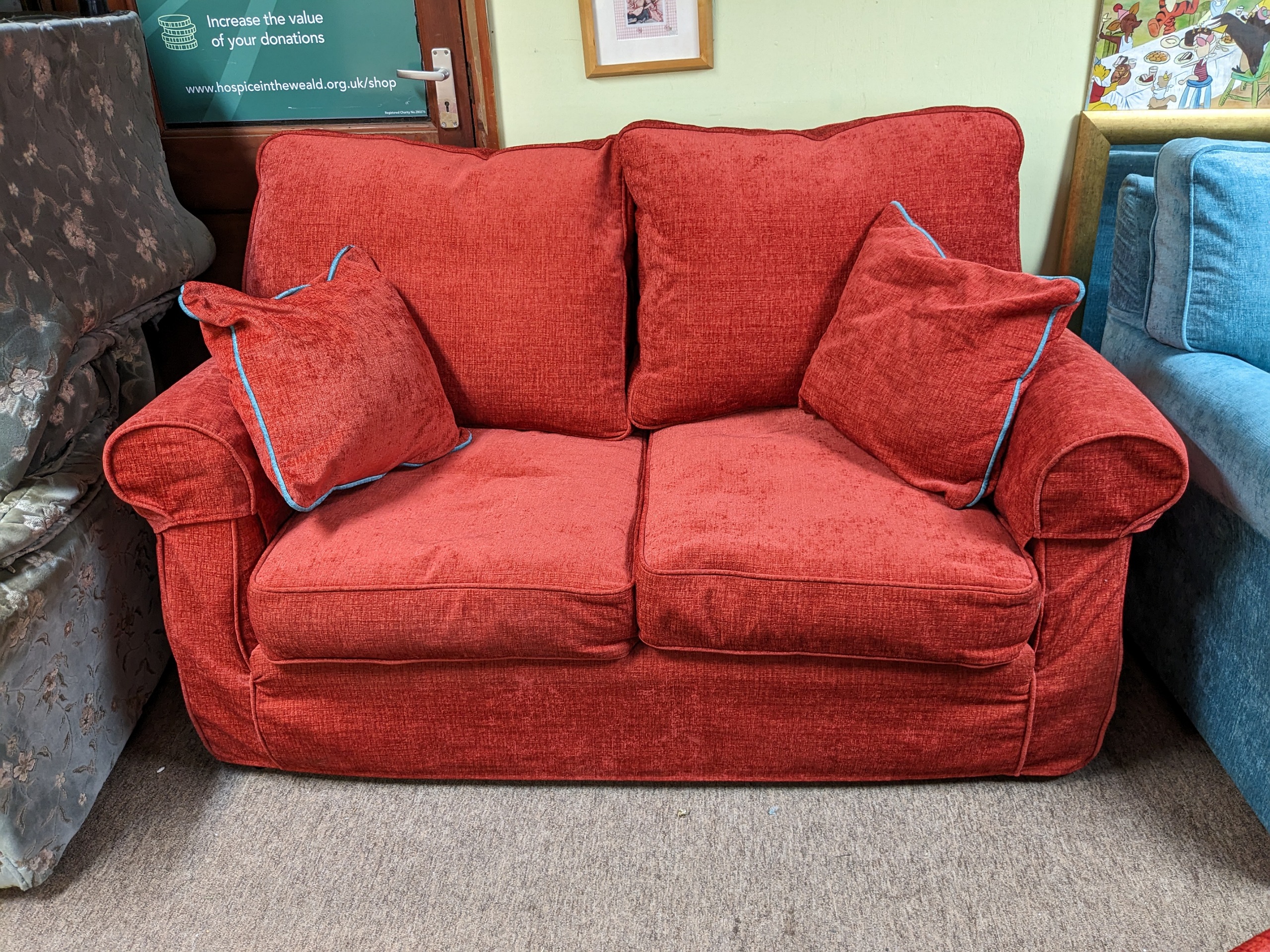 Red fabric two seat sofa