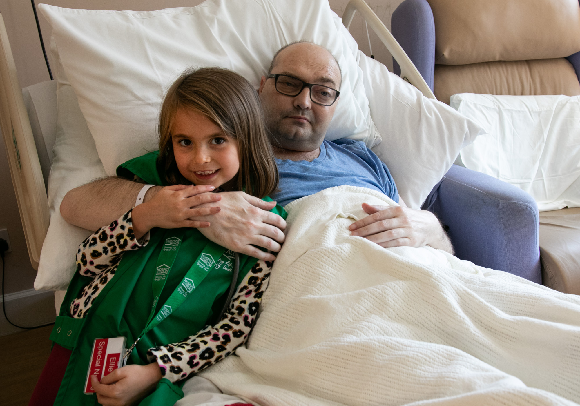 Simon hugging his daughter Ellie whilst staying on our ward