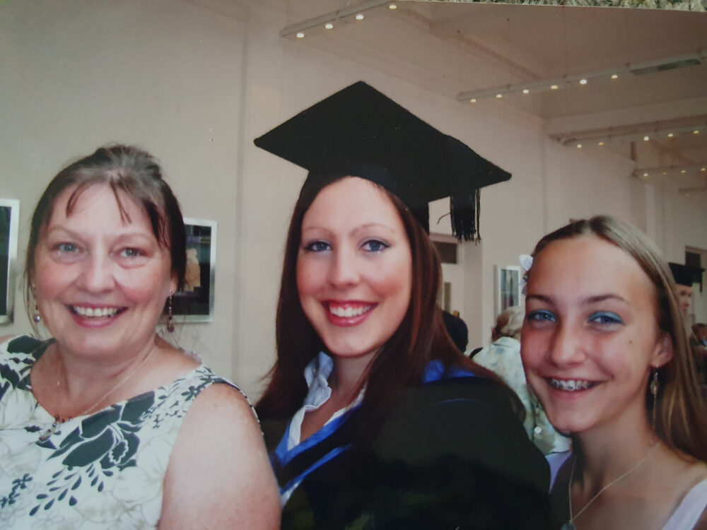 Becky, Mum and Sister with Becky in a graduation gown