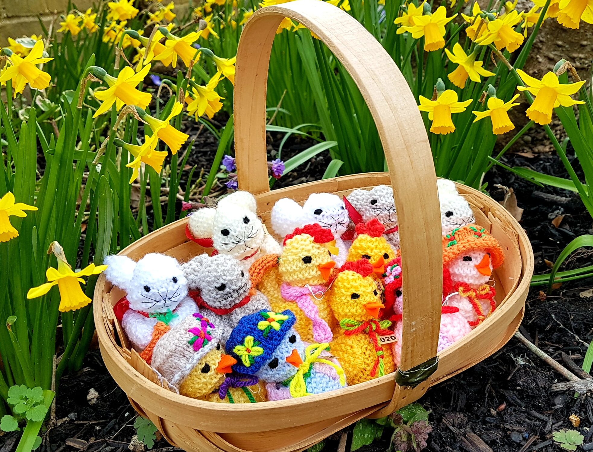 Knitted collection of animals in basket